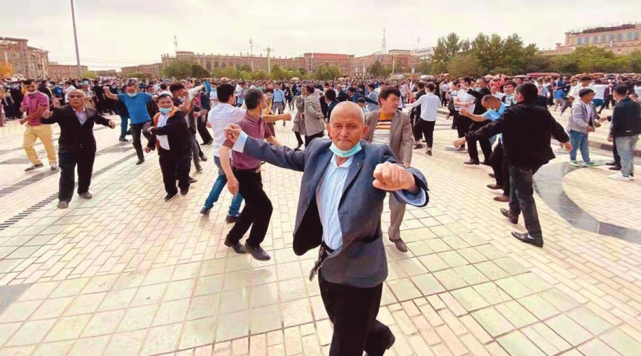 People dance to celebrate Eid al-Fitr in Kashi, Xinjiang