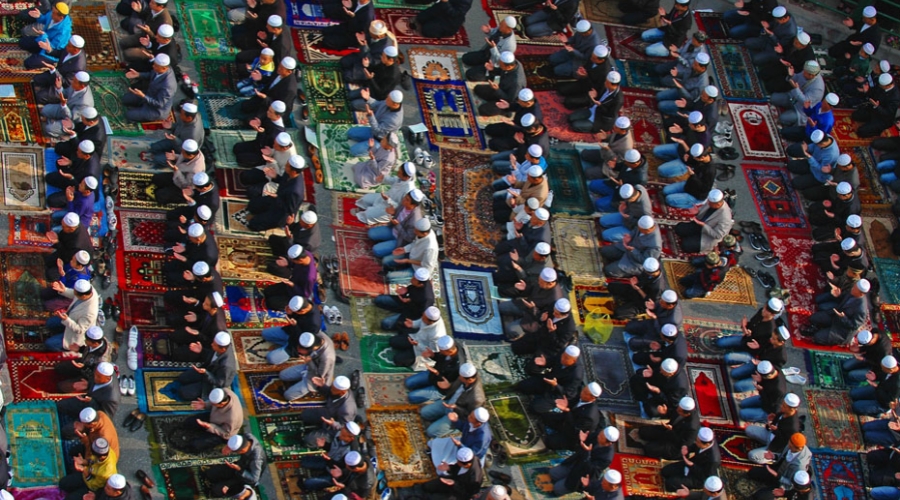 Muslim worshippers attending Eid al-Fitr congregational prayer at a mosque in Xining, Qinghai