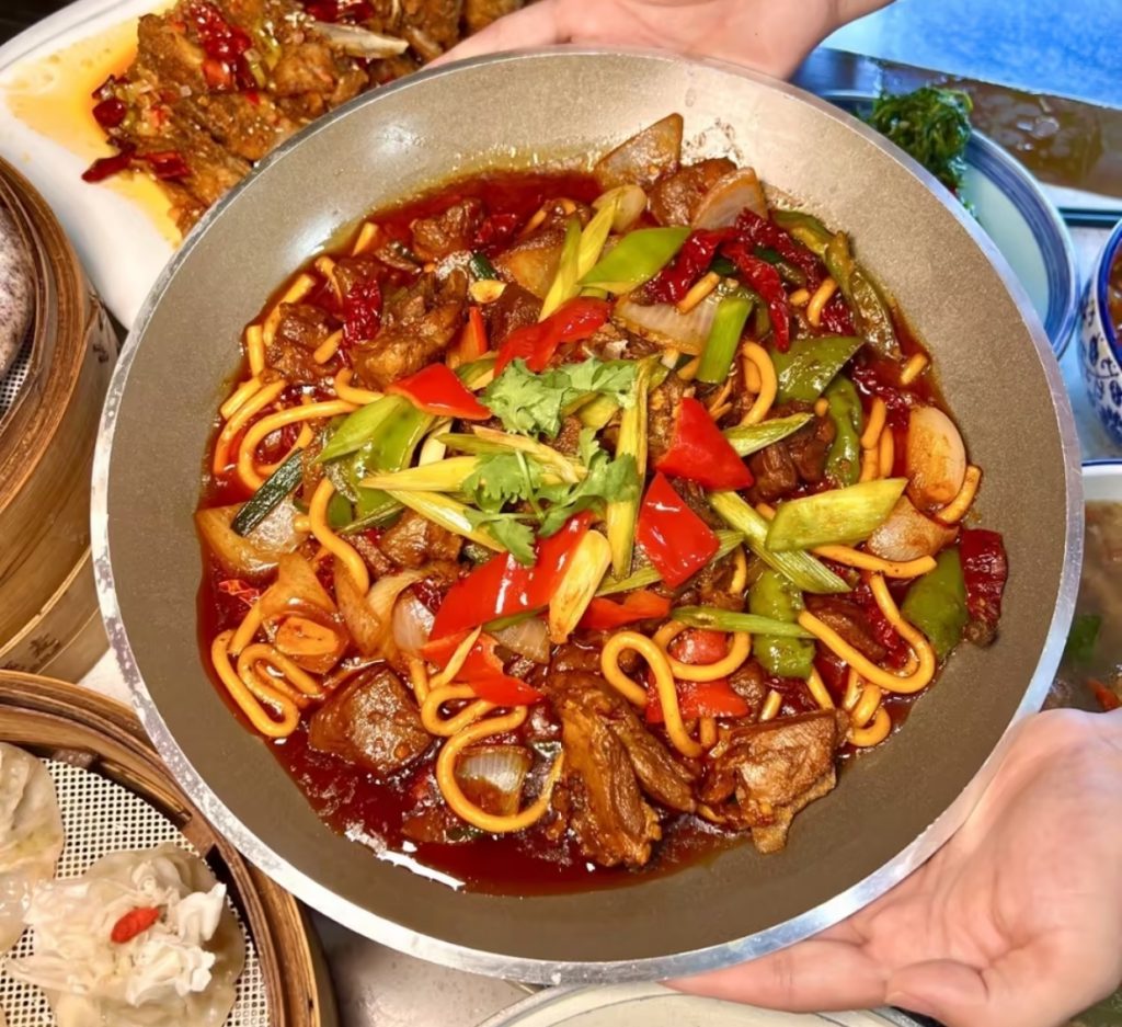 Xinjiang Big Plate Chicken with noodles