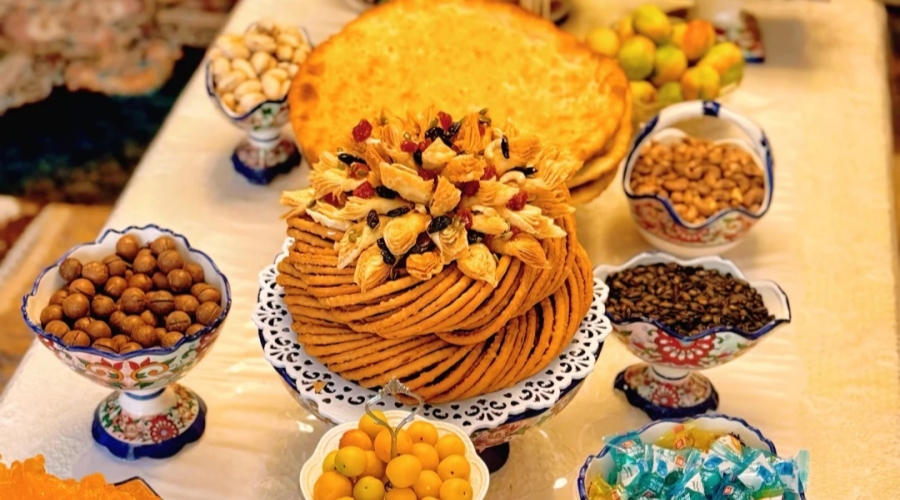 A traditional Eid al-Fitr spread in Xinjiang featuring nuts, dried fruits, and pastries