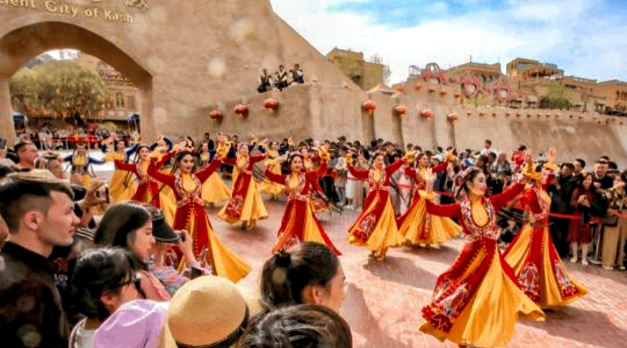 Uyghur ethnic group celebrating in Kashgar Old City, Xinjiang, with song and dance performances